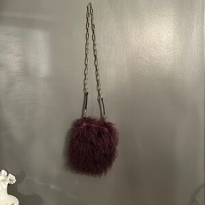 Vintage purple Mongolian Fur cross body bag with a leather and chain strap